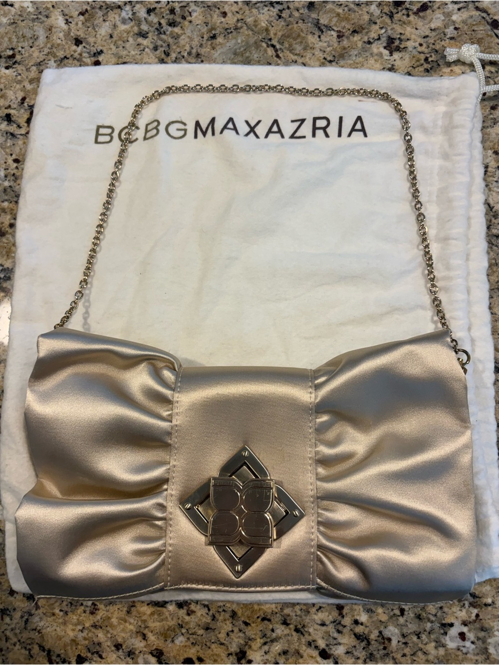 BCBGMAXAZRIA Metallic Gold Bow Clutch with Chain with dust bag *see flaws*
